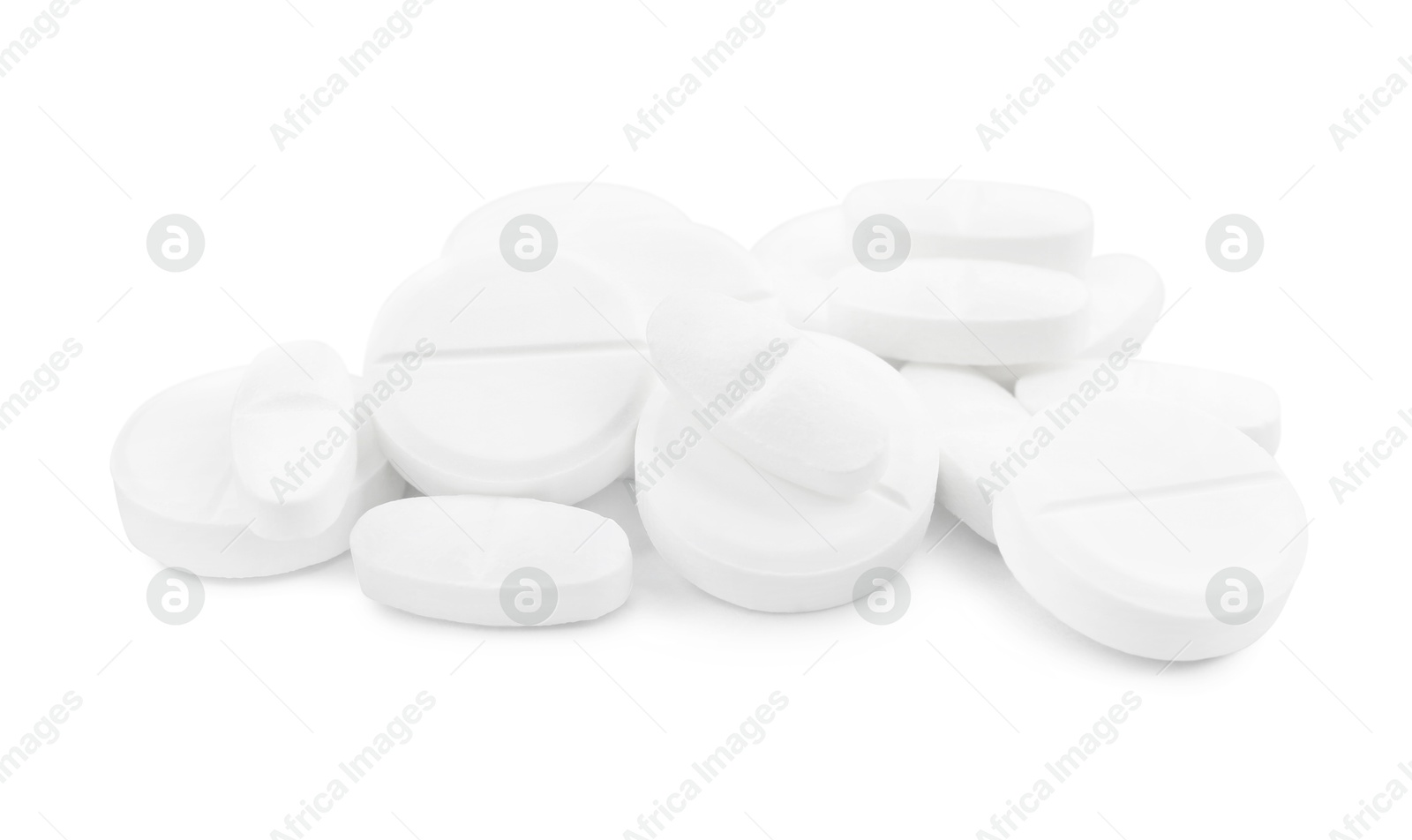 Photo of Pile of antibiotic pills on light grey background, closeup