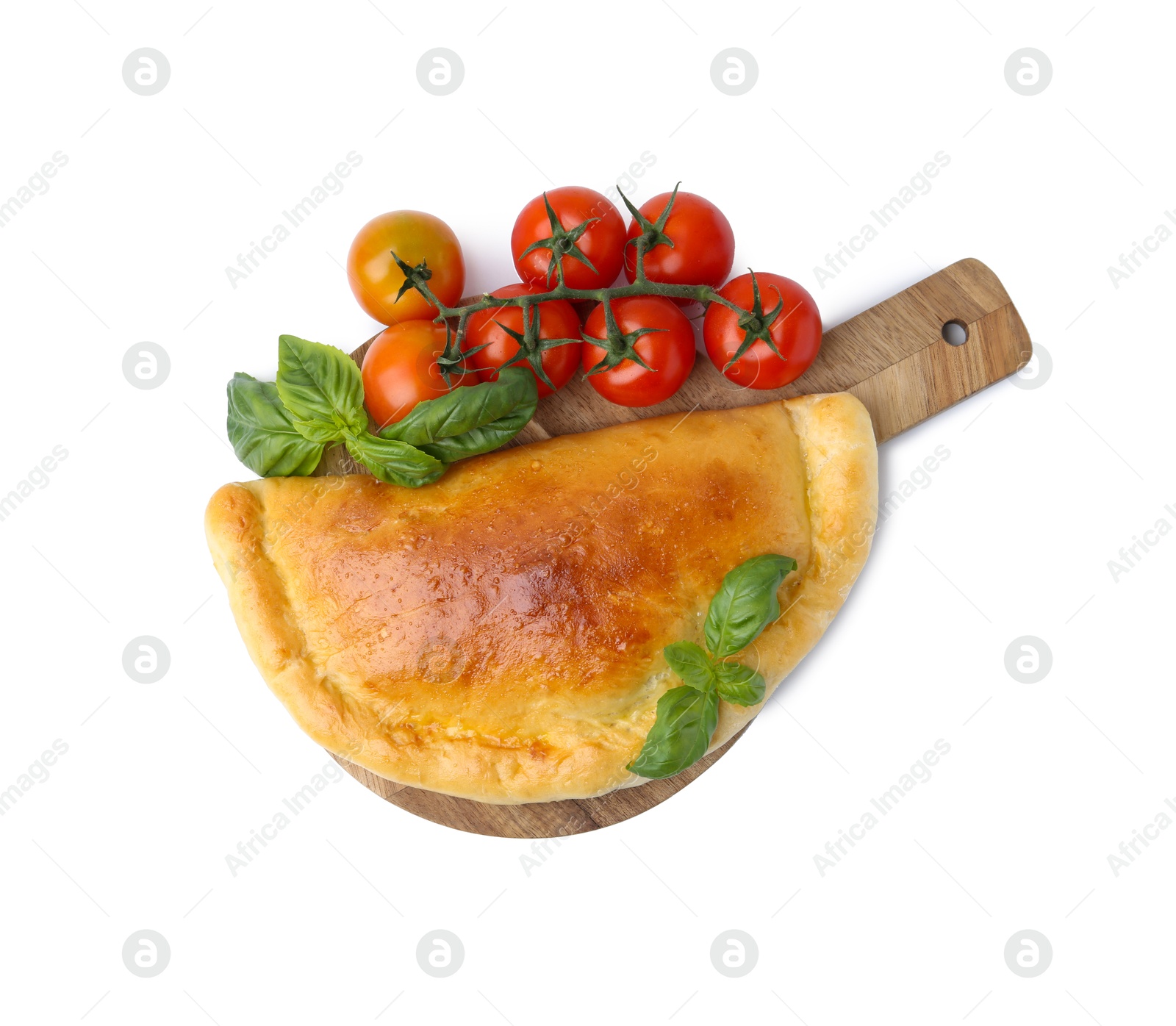 Photo of Tasty vegetarian calzone with basil and tomatoes isolated on white, top view