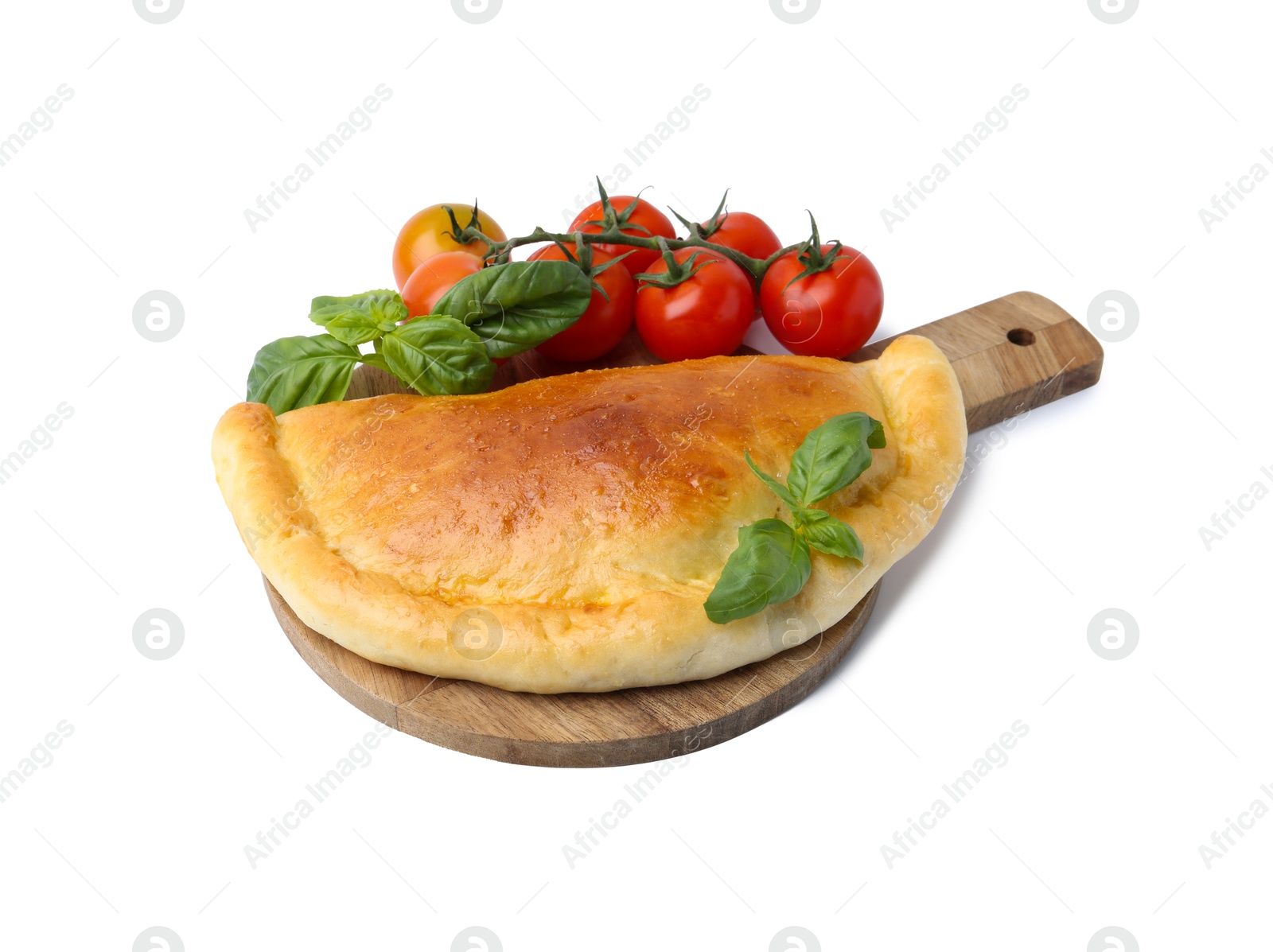 Photo of Tasty vegetarian calzone with basil and tomatoes isolated on white