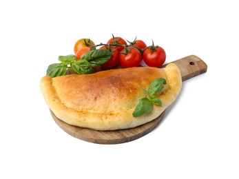 Photo of Tasty vegetarian calzone with basil and tomatoes isolated on white