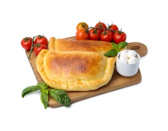 Photo of Tasty vegetarian calzones with basil, mozzarella cheese and tomatoes isolated on white