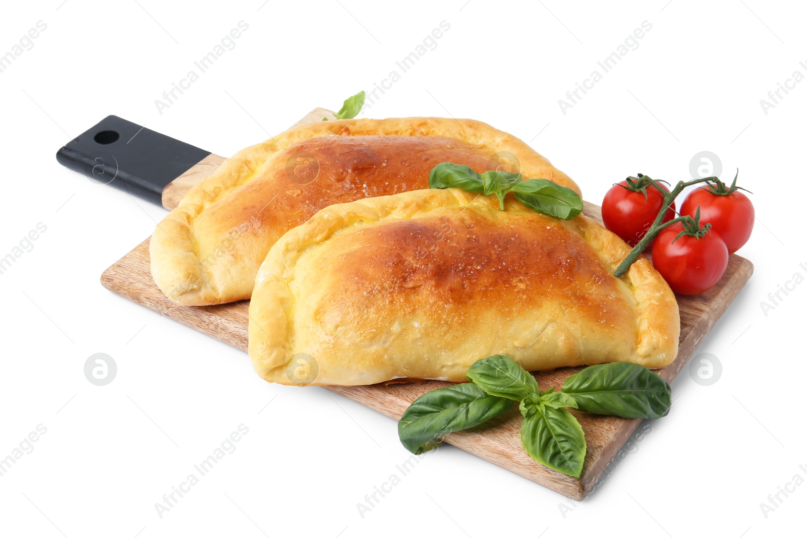 Photo of Tasty vegetarian calzones with basil and tomatoes isolated on white