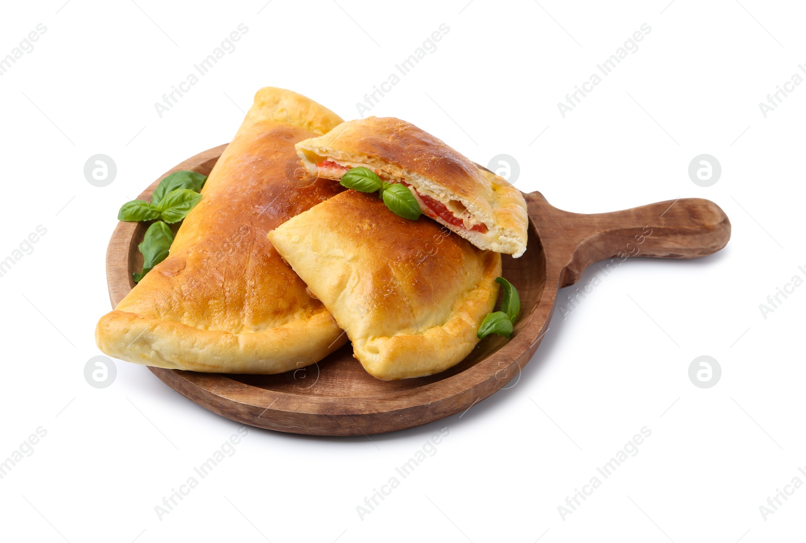 Photo of Tasty vegetarian calzones with tomato, cheese and basil isolated on white