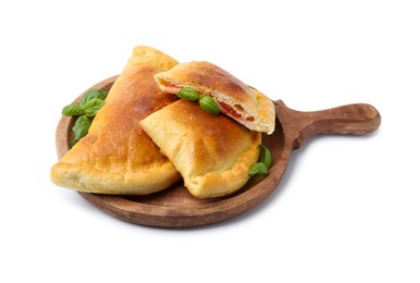 Photo of Tasty vegetarian calzones with tomato, cheese and basil isolated on white