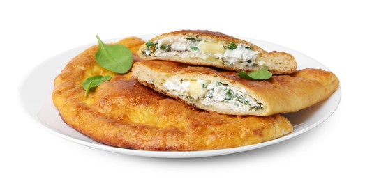 Photo of Tasty calzones with cheese and basil isolated on white