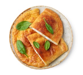 Photo of Tasty calzones with basil and cheese isolated on white, top view