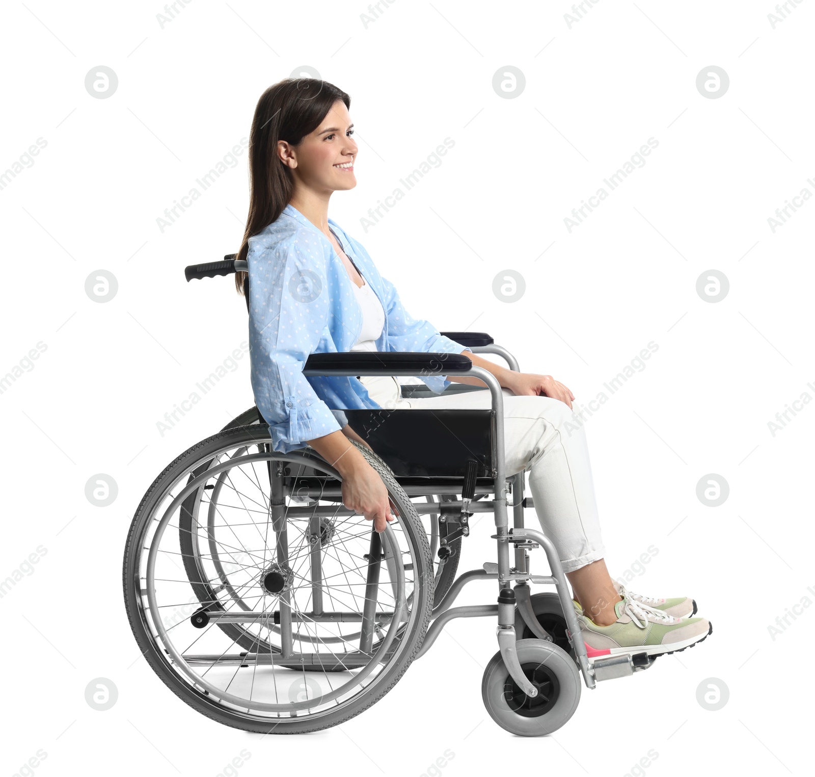 Photo of Smiling woman in wheelchair on white background