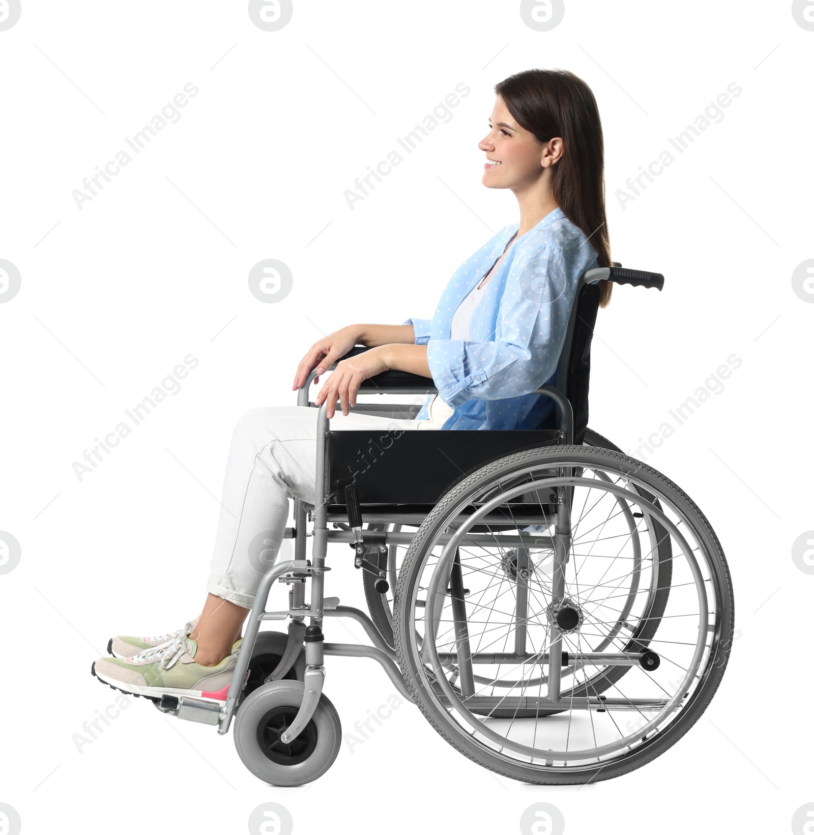 Photo of Smiling woman in wheelchair on white background