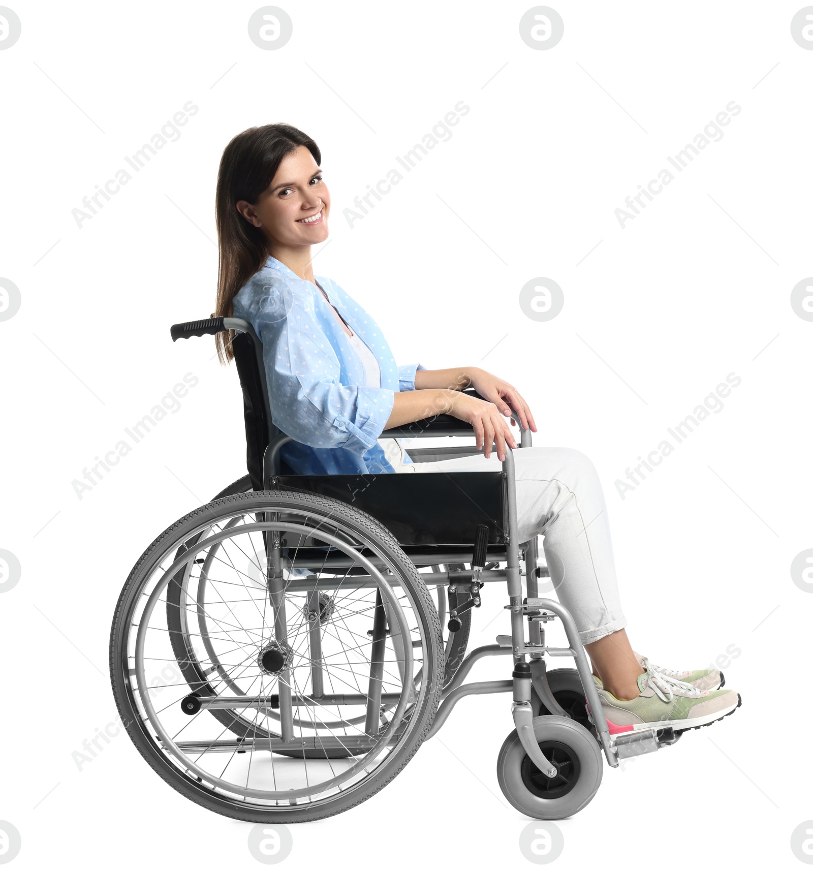 Photo of Smiling woman in wheelchair on white background