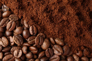 Ground coffee and roasted beans as background, top view