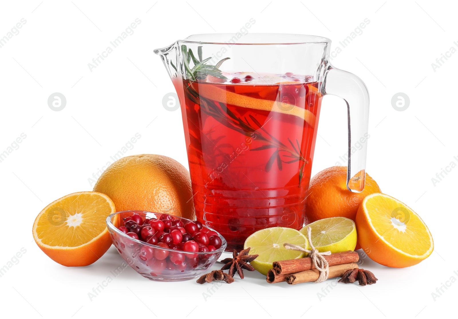 Photo of Aromatic punch drink in glass jug and ingredients on white background