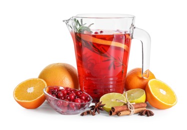 Photo of Aromatic punch drink in glass jug and ingredients on white background