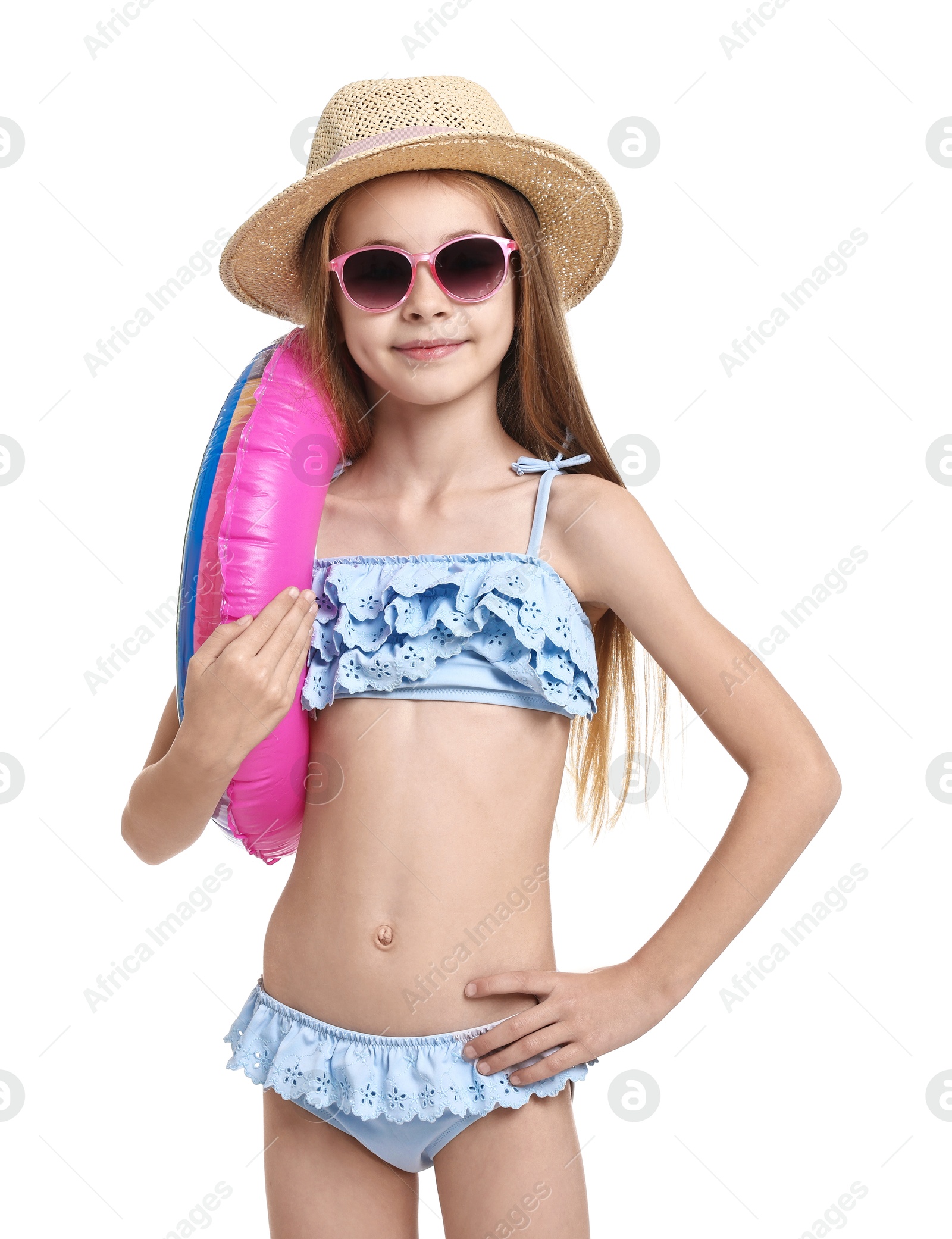 Photo of Little girl in beachwear with inflatable ring on white background