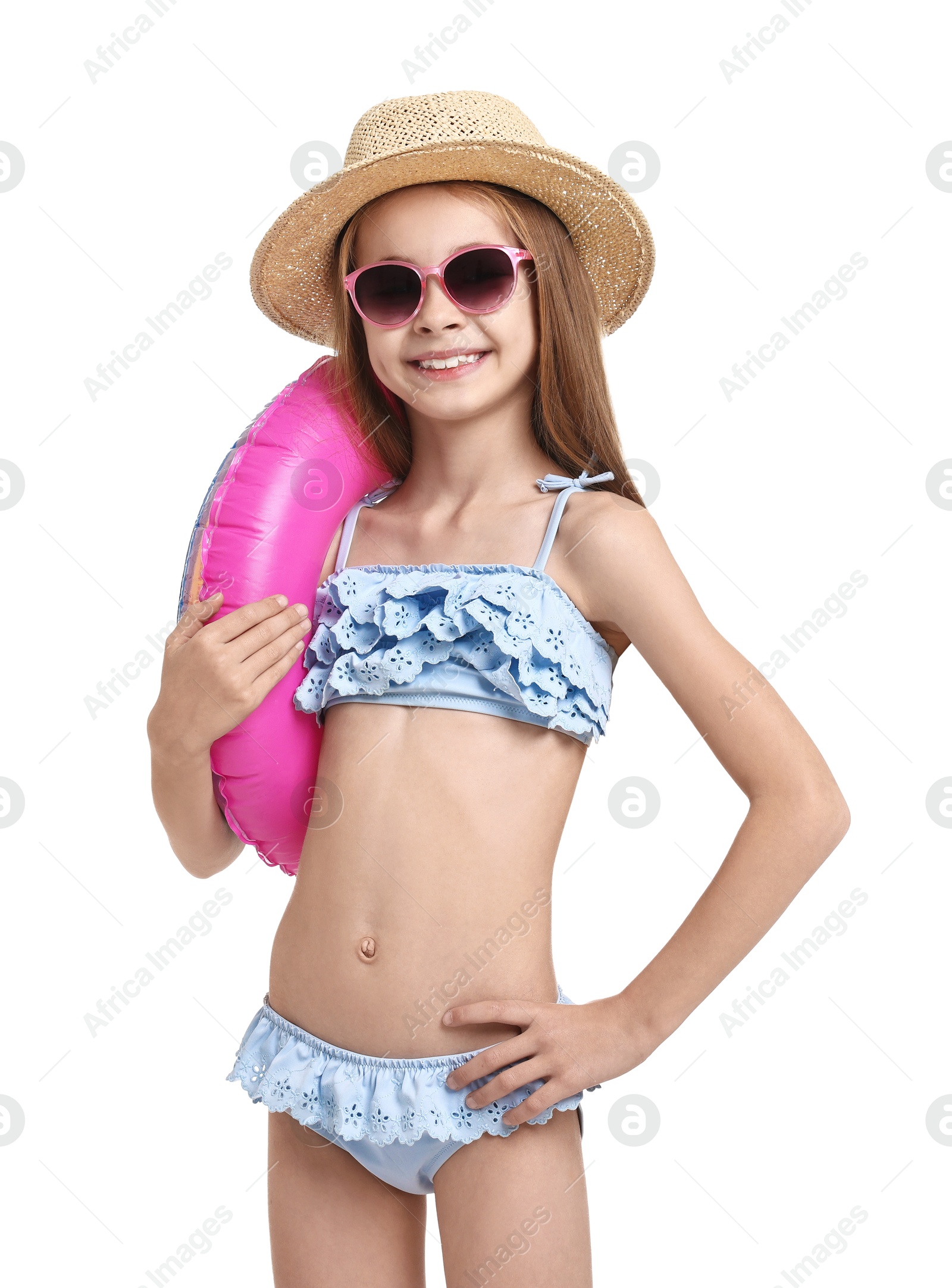 Photo of Little girl in beachwear with inflatable ring on white background