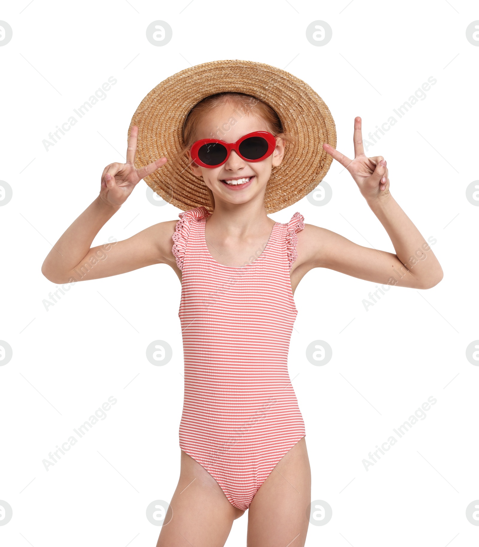 Photo of Happy girl in beachwear showing peace sign on white background