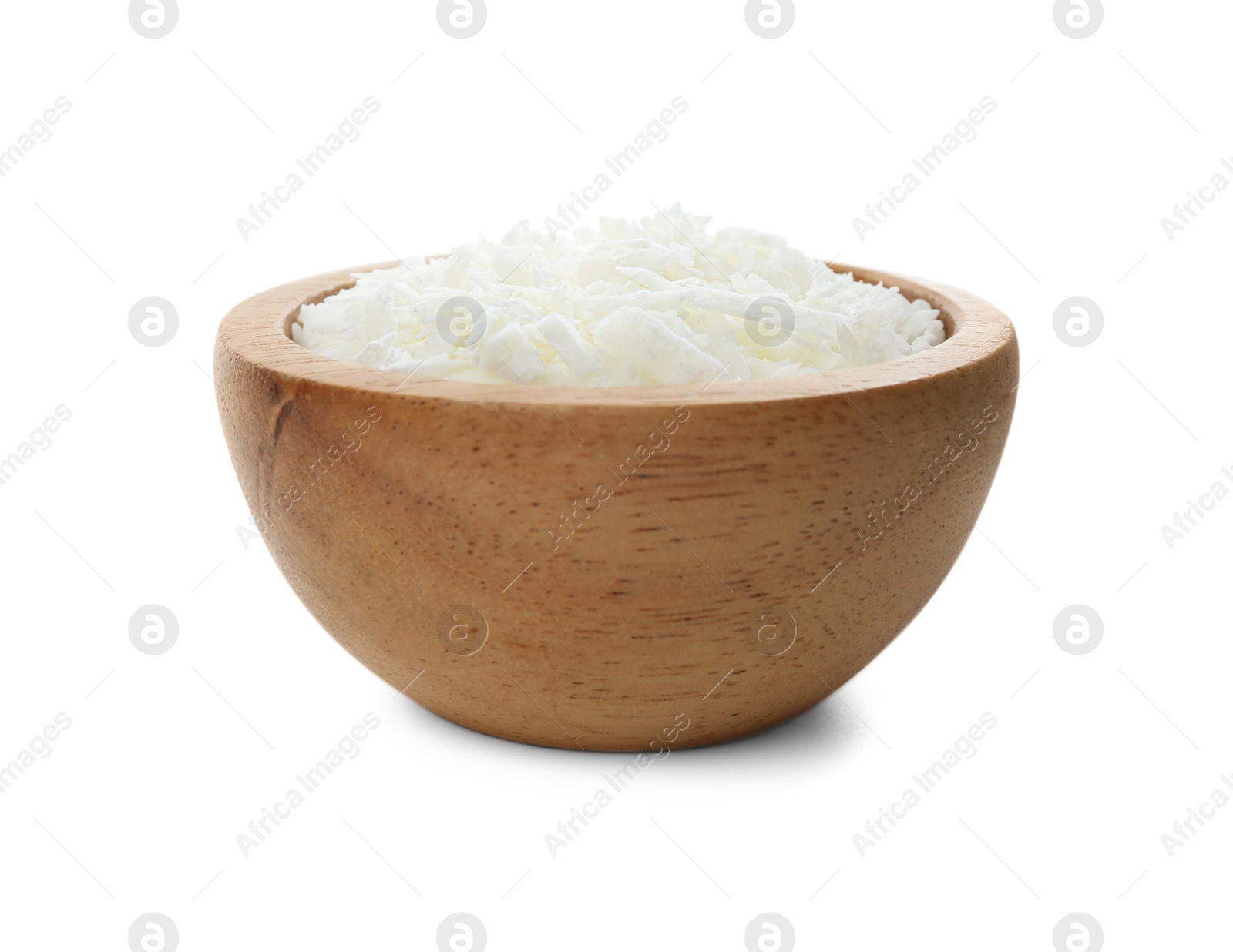 Photo of Soy wax in wooden bowl isolated on white