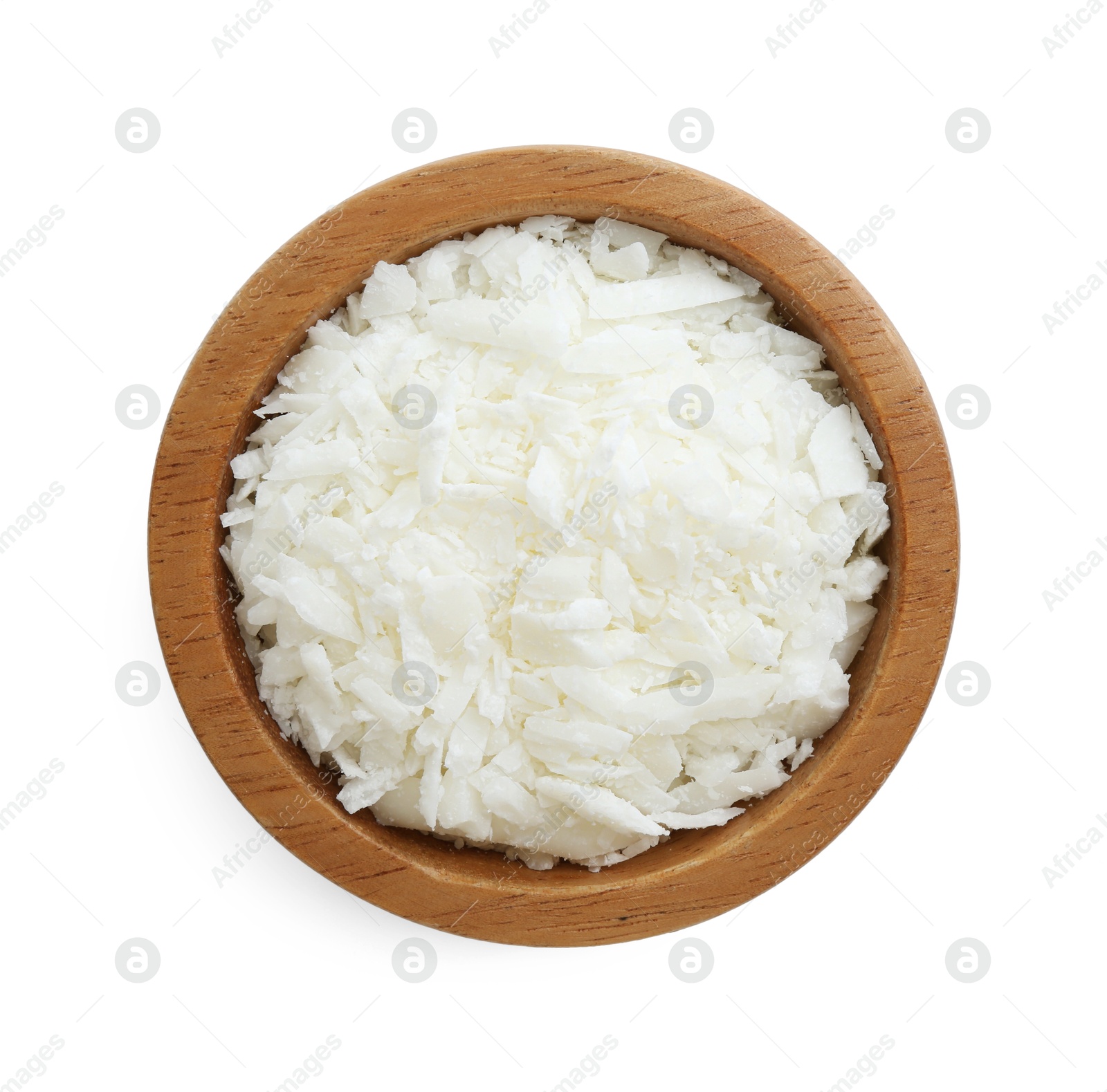 Photo of Soy wax in wooden bowl isolated on white, top view