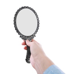 Woman holding vintage mirror on white background, closeup