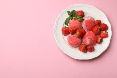 Photo of Delicious mochi, strawberries and mint on pink background, top view. Space for text