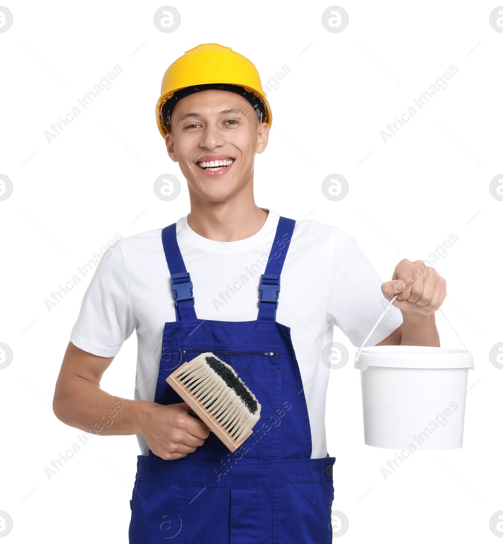 Photo of Portrait of young decorator with paint brush and bucket on white background