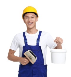 Photo of Portrait of young decorator with paint brush and bucket on white background