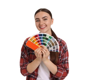 Photo of Portrait of young decorator with color palettes on white background