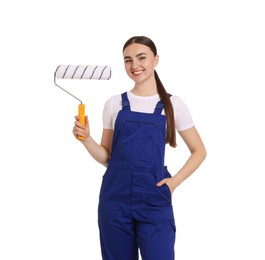 Photo of Portrait of young decorator with paint roller on white background