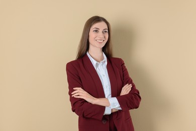 Photo of Portrait of smiling banker on beige background