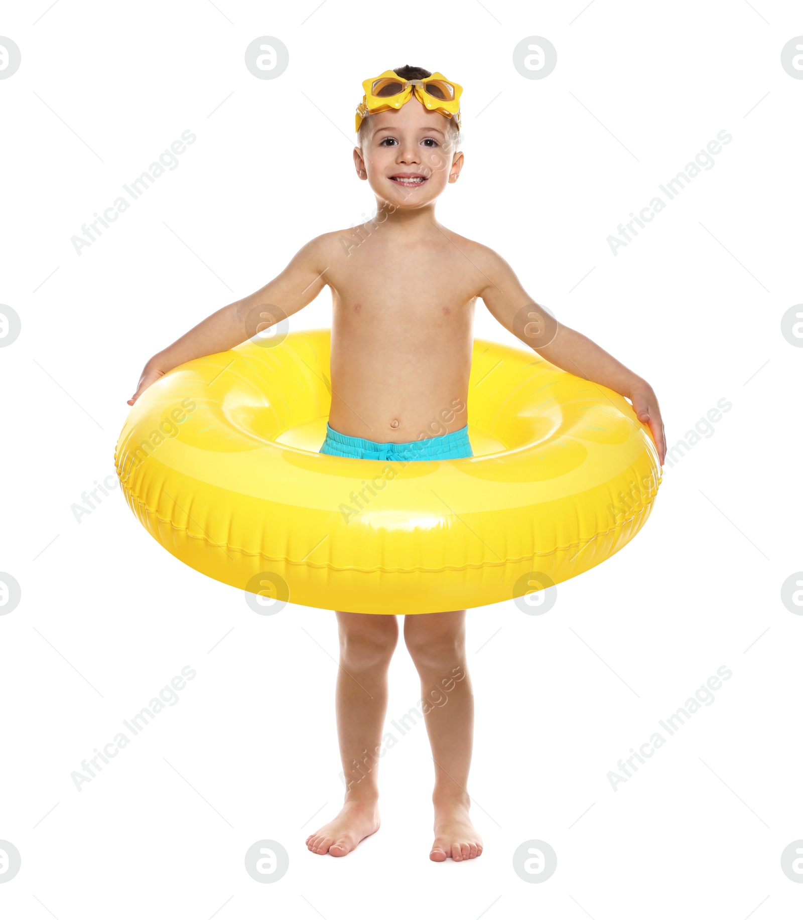 Photo of Cute little boy in beachwear with diving mask and inflatable ring on white background