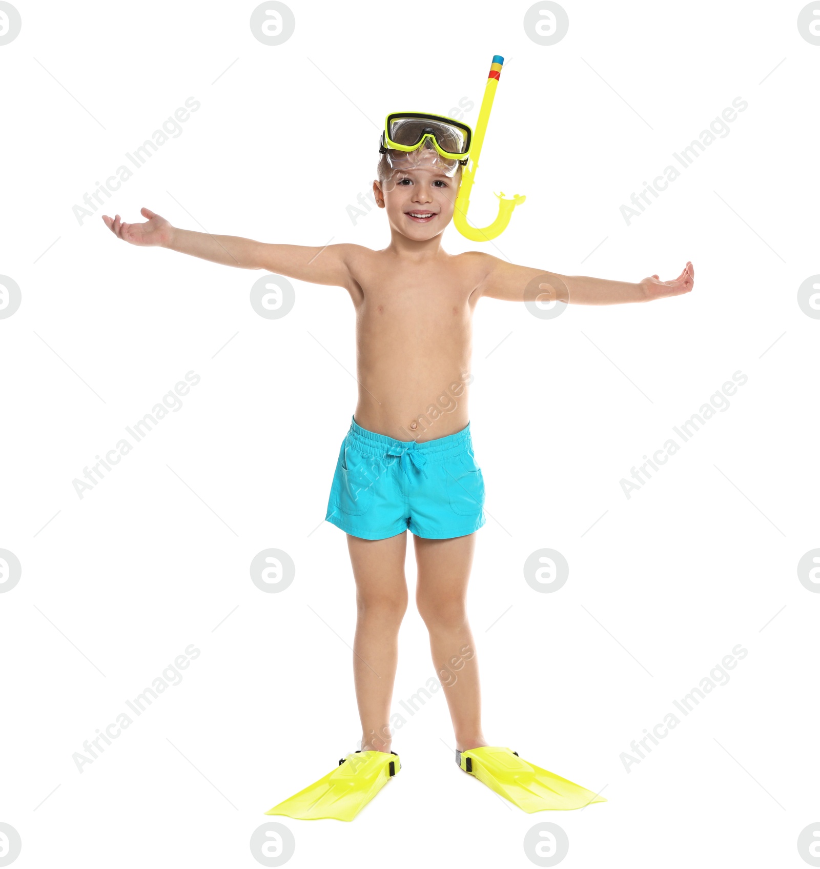 Photo of Cute little boy in beachwear with snorkeling equipment on white background