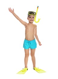 Photo of Cute little boy in beachwear with snorkeling equipment on white background