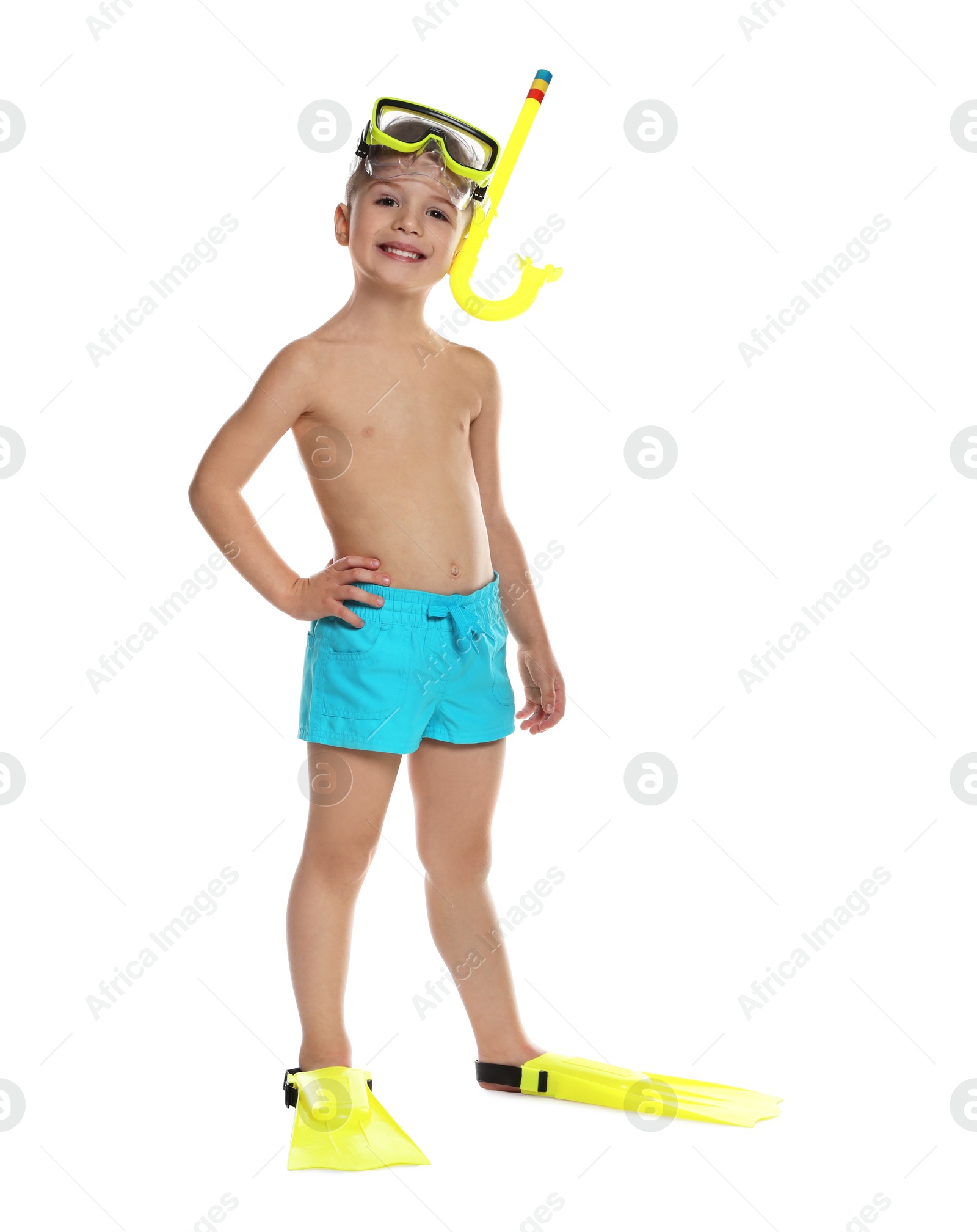 Photo of Cute little boy in beachwear with snorkeling equipment on white background