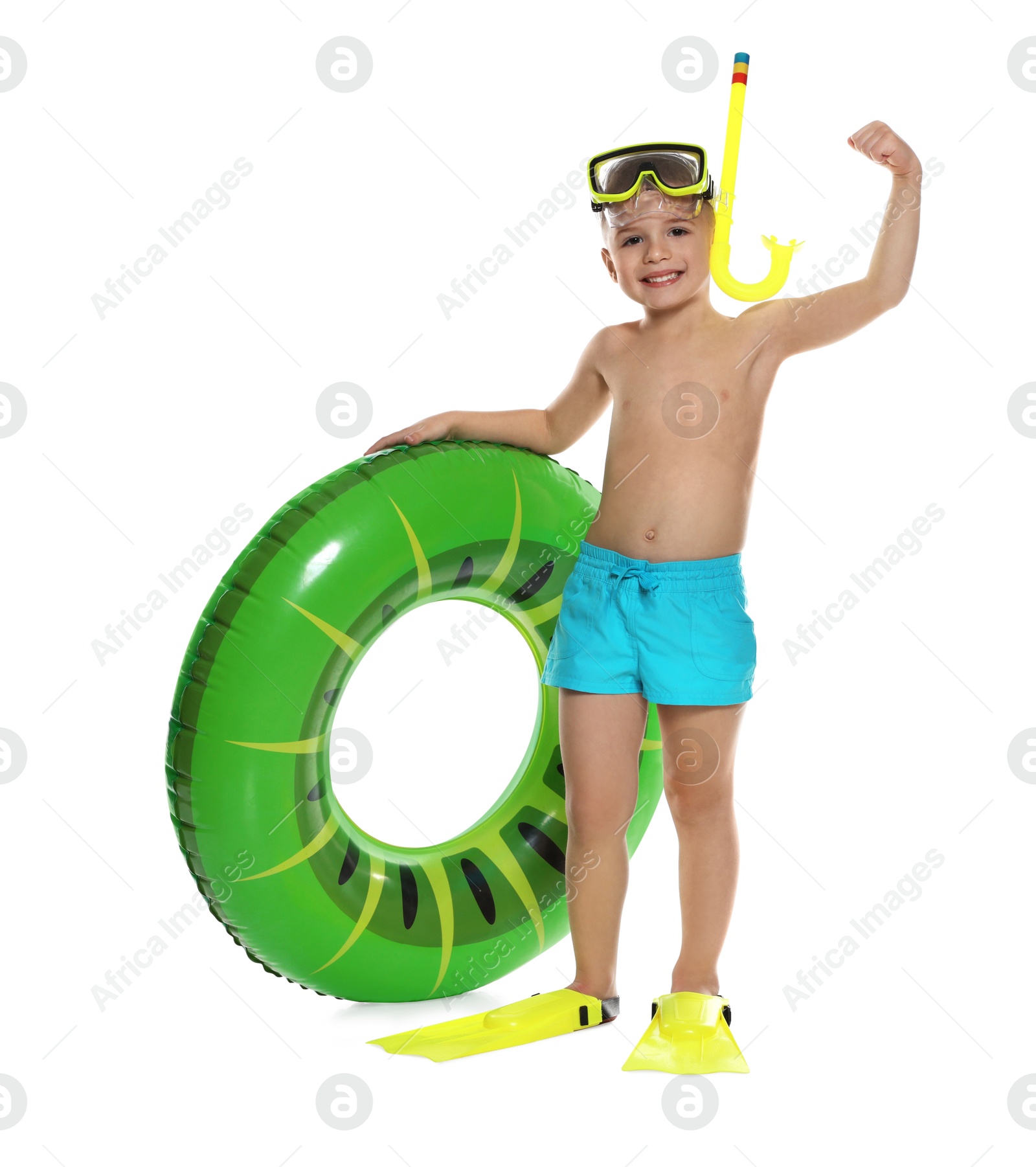 Photo of Cute little boy in beachwear with snorkeling equipment and inflatable ring on white background