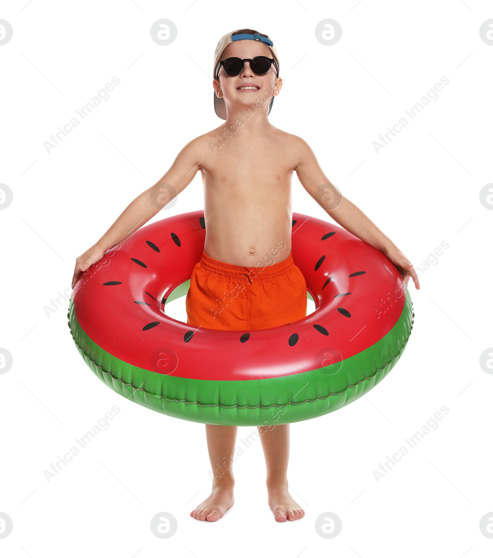 Photo of Cute little boy in beachwear with inflatable ring on white background