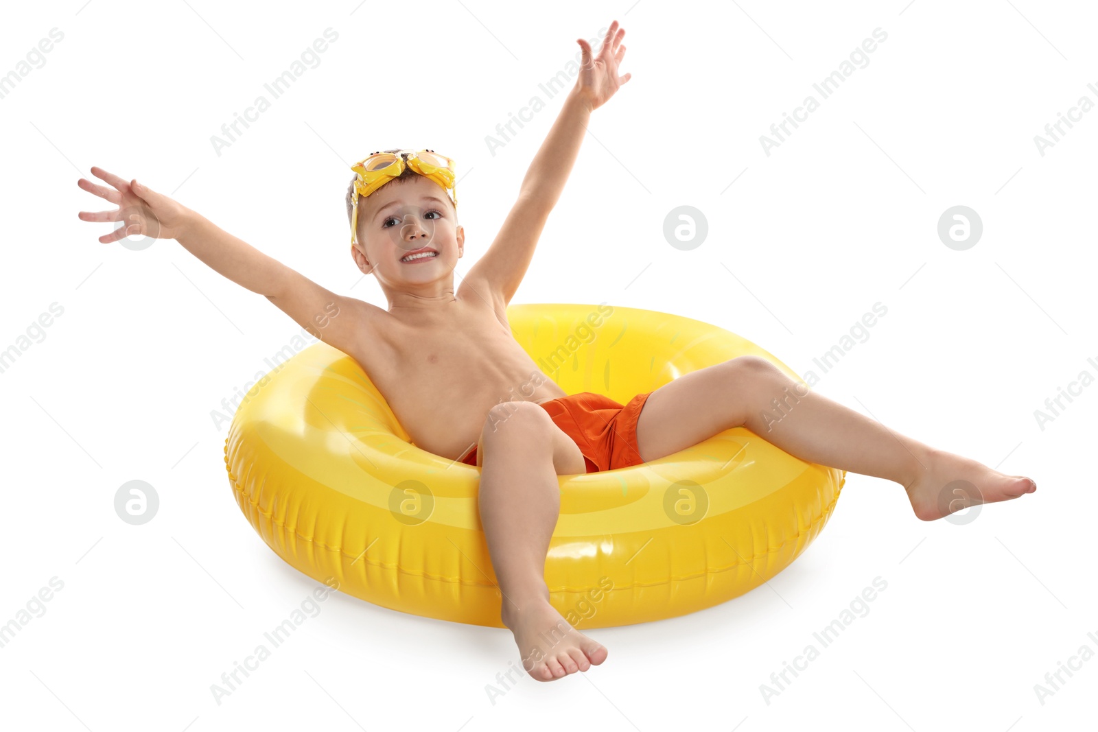 Photo of Cute little boy in beachwear with diving mask and inflatable ring on white background