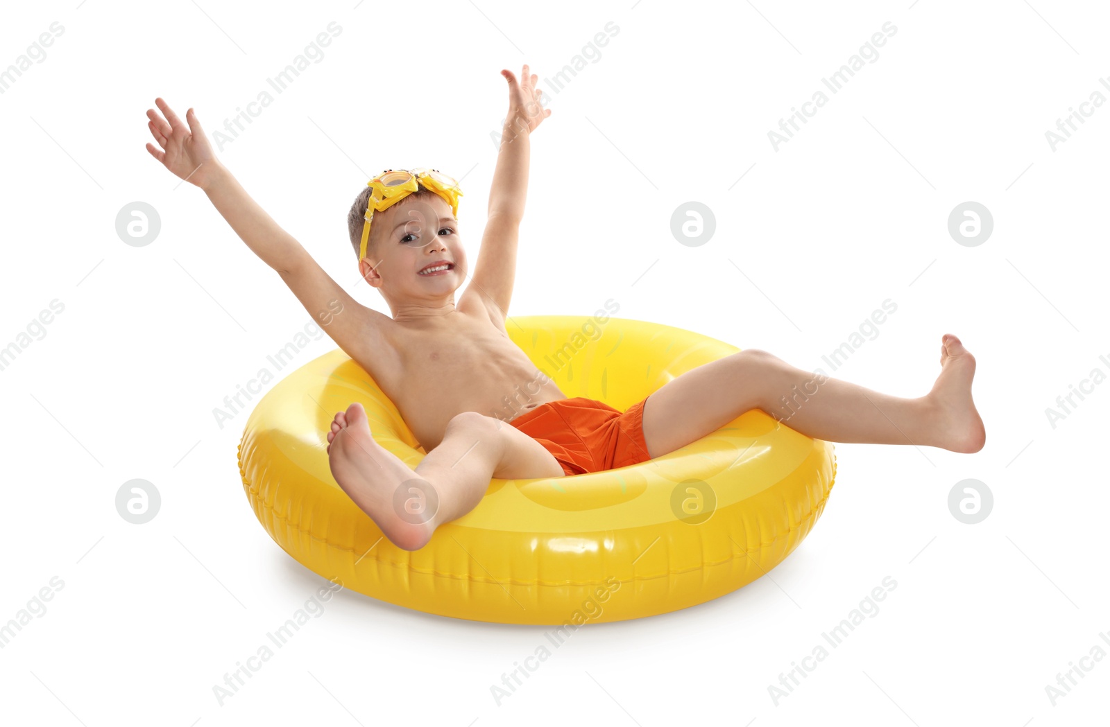 Photo of Cute little boy in beachwear with diving mask and inflatable ring on white background