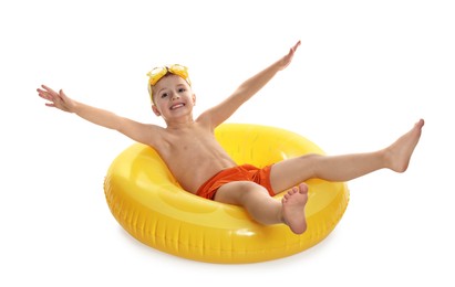 Cute little boy in beachwear with diving mask and inflatable ring on white background