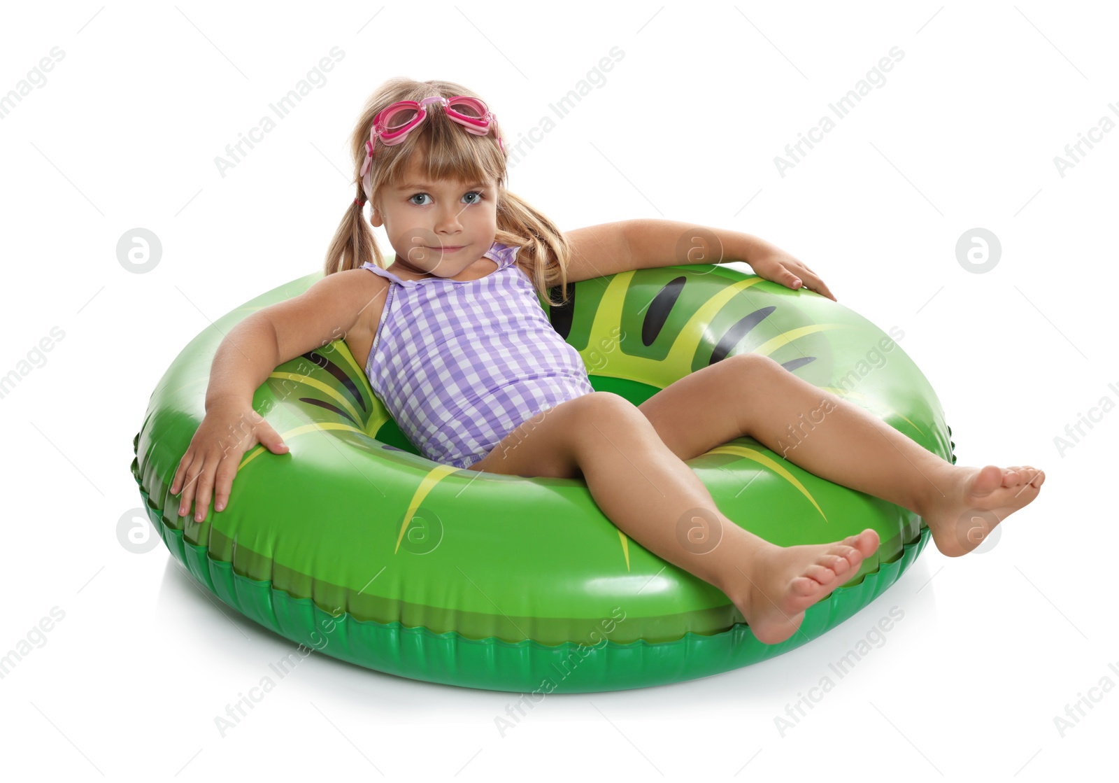 Photo of Cute little girl in beachwear with diving mask and inflatable ring on white background