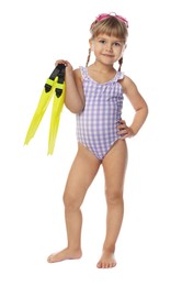 Cute little girl in swimsuit with flippers and swim goggles on white background