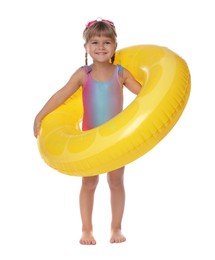 Photo of Cute little girl in swimsuit with inflatable ring on white background