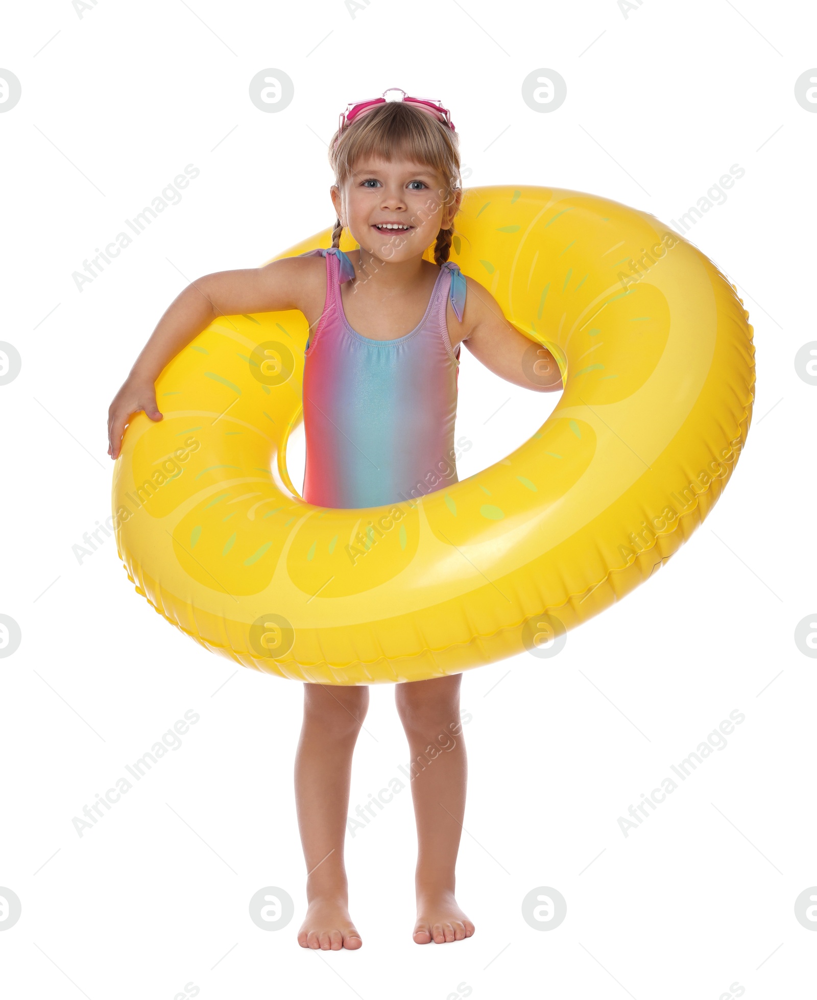 Photo of Cute little girl in swimsuit with inflatable ring on white background