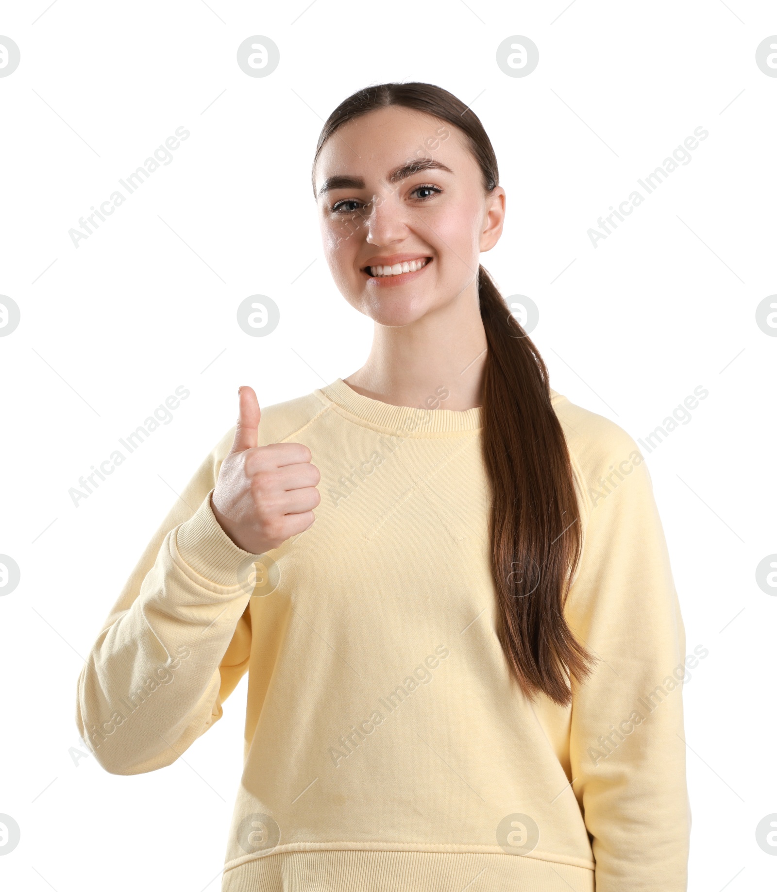 Photo of Happy woman showing thumbs up on white background. Like gesture