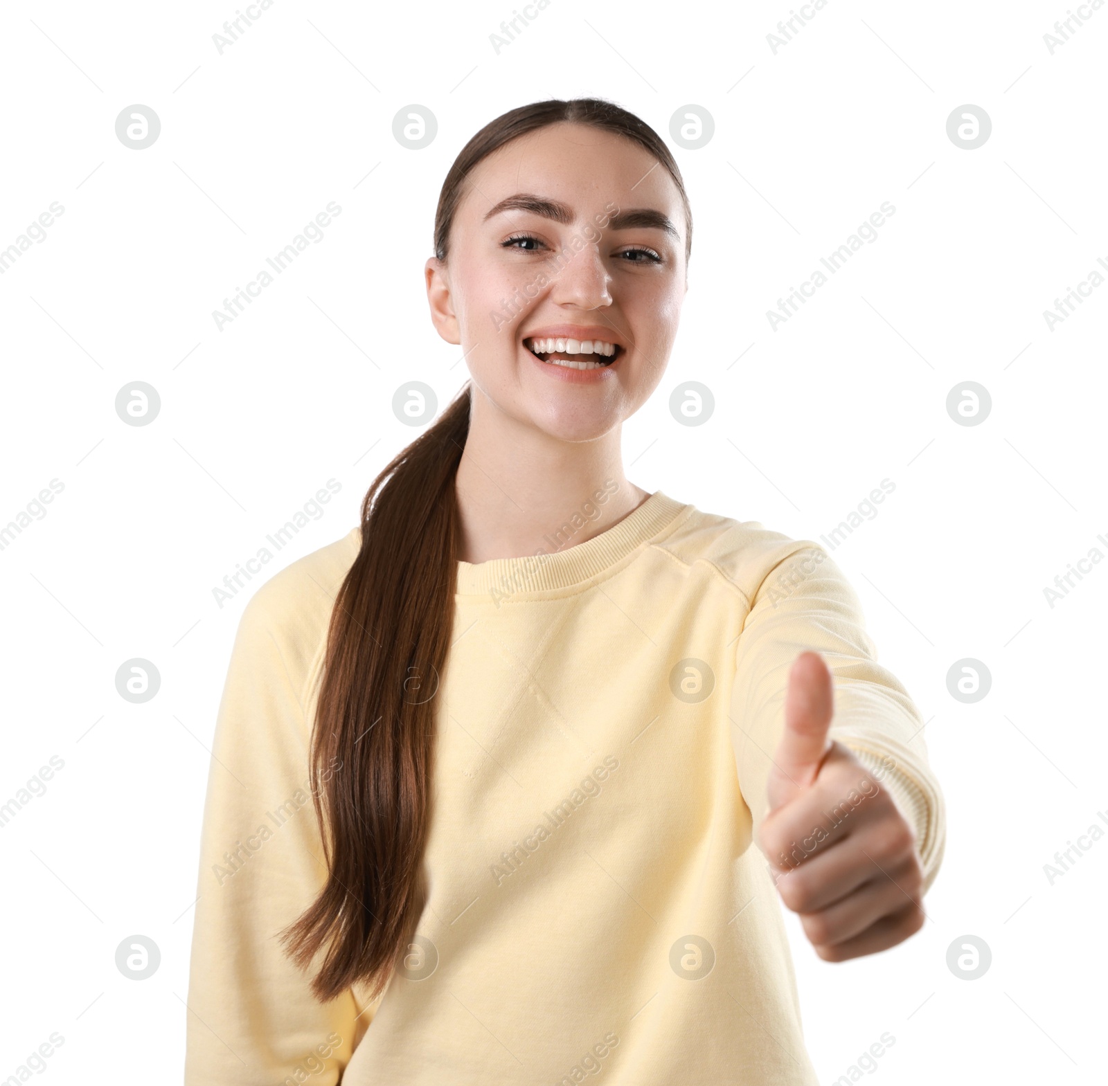 Photo of Happy woman showing thumbs up on white background. Like gesture