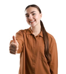 Photo of Happy woman showing thumbs up on white background. Like gesture