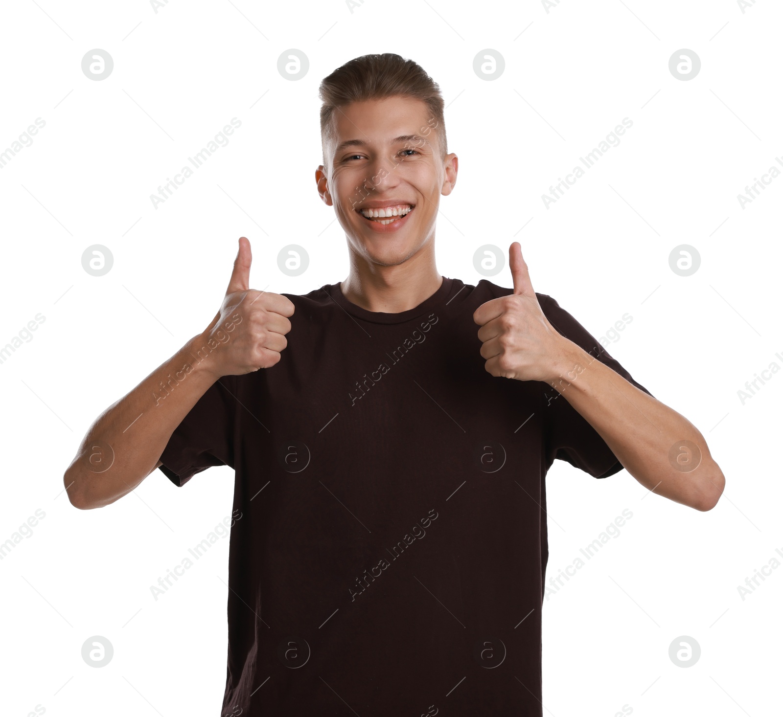 Photo of Happy man showing thumbs up on white background. Like gesture