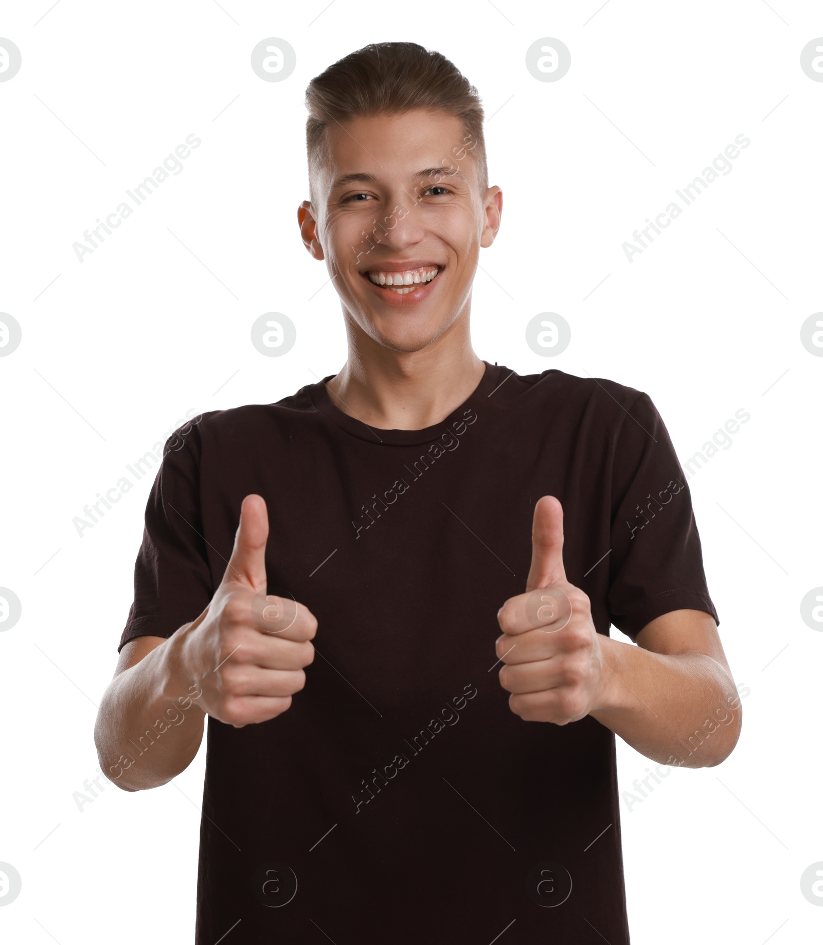 Photo of Happy man showing thumbs up on white background. Like gesture