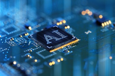 Image of Artificial intelligence. Electronic chip with AI abbreviation on computer circuit board, closeup