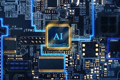 Image of Artificial intelligence. Electronic chip with AI abbreviation on computer motherboard, top view