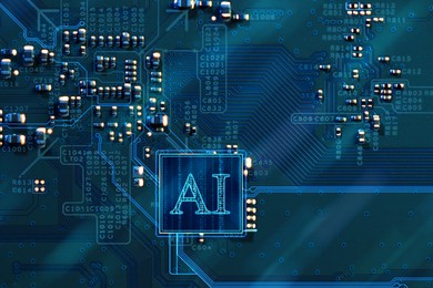 Image of Artificial intelligence. Electronic chip with AI abbreviation on circuit board, top view