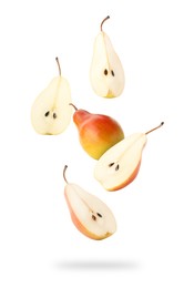 Fresh juicy pears in air on white background